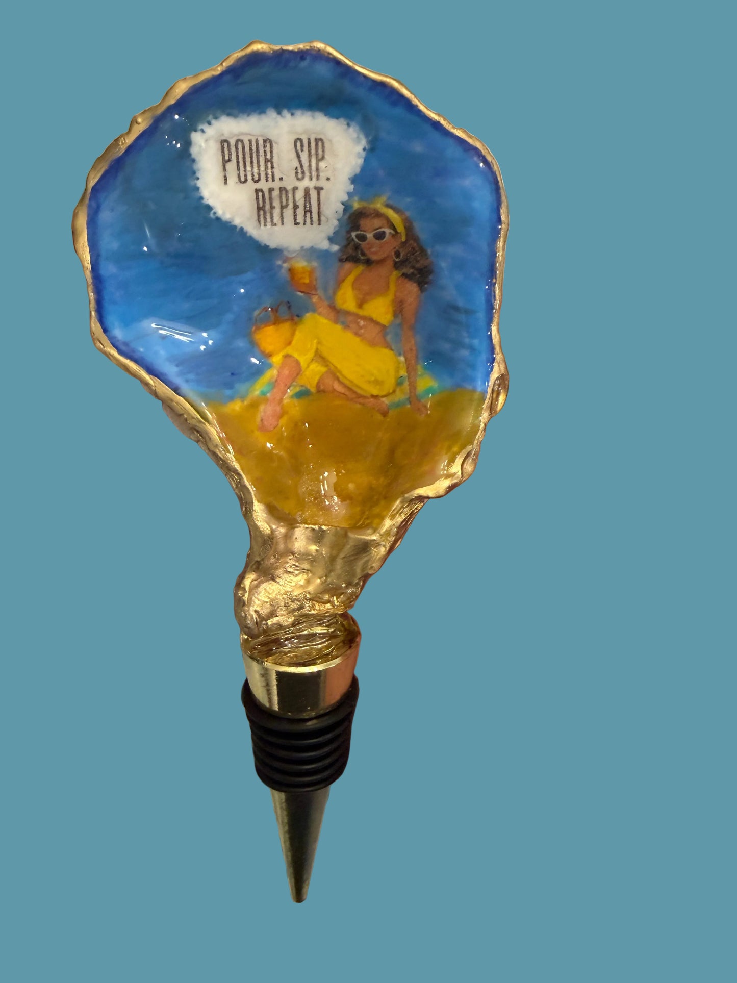 decorative bottle stopper with a colorful Sassy girl design on a patterned background