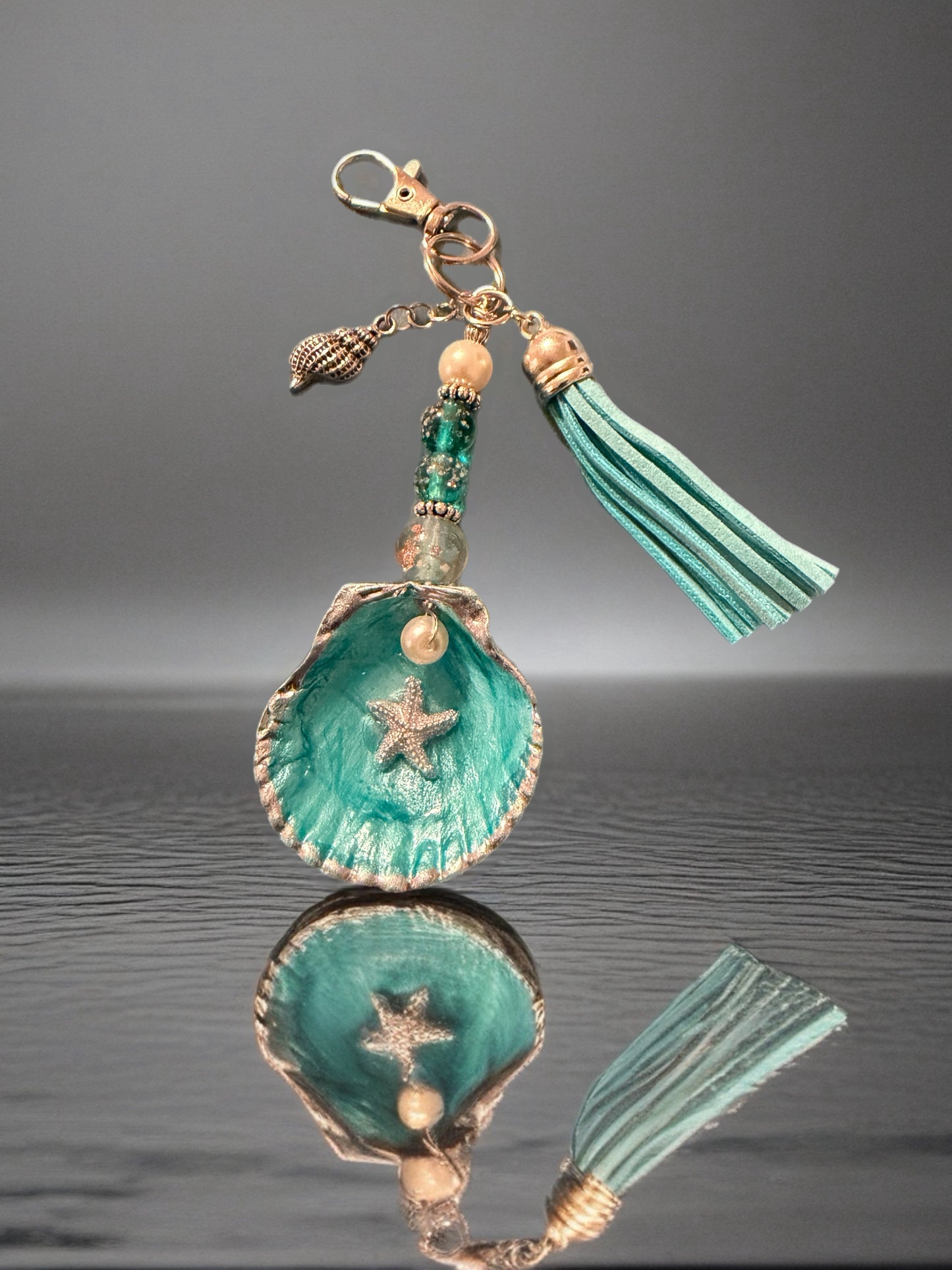Starfish with pearl on a teal scallop shell- purse charm