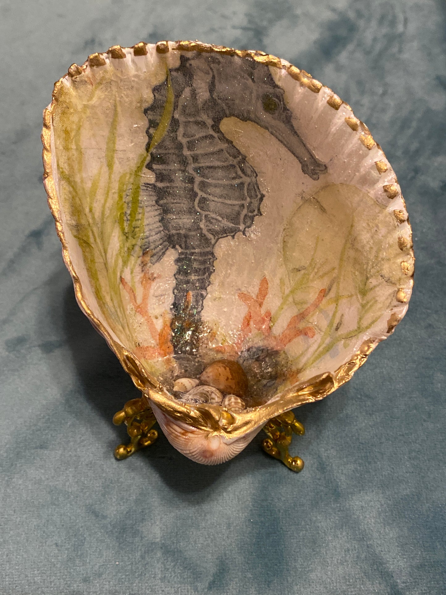 Seahorse on stand -large cockle shell