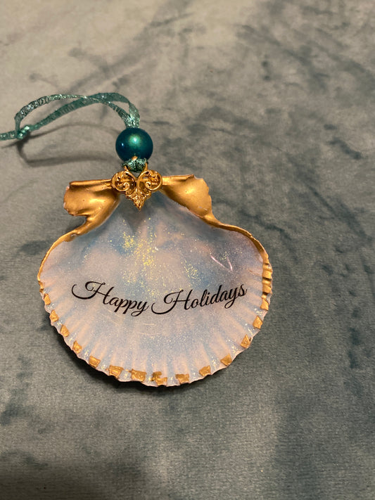 “Happy Holidays” with blue shimmer background -scallop shell