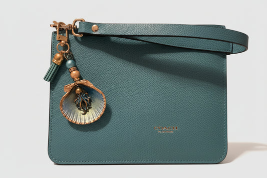 Octopus charm on a scallop shell purse charm