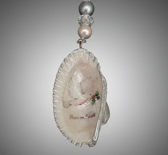 White dove with "Peace on Earth" on Angel Shell