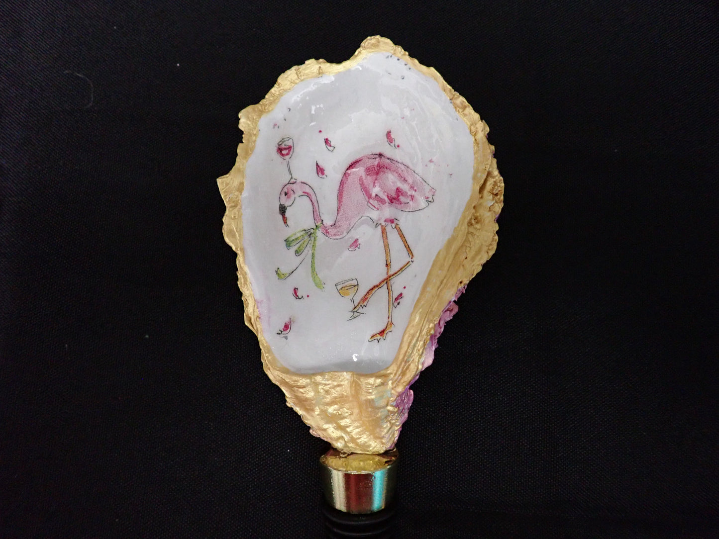 Flamingo with wine glass on head & holding a wine glass