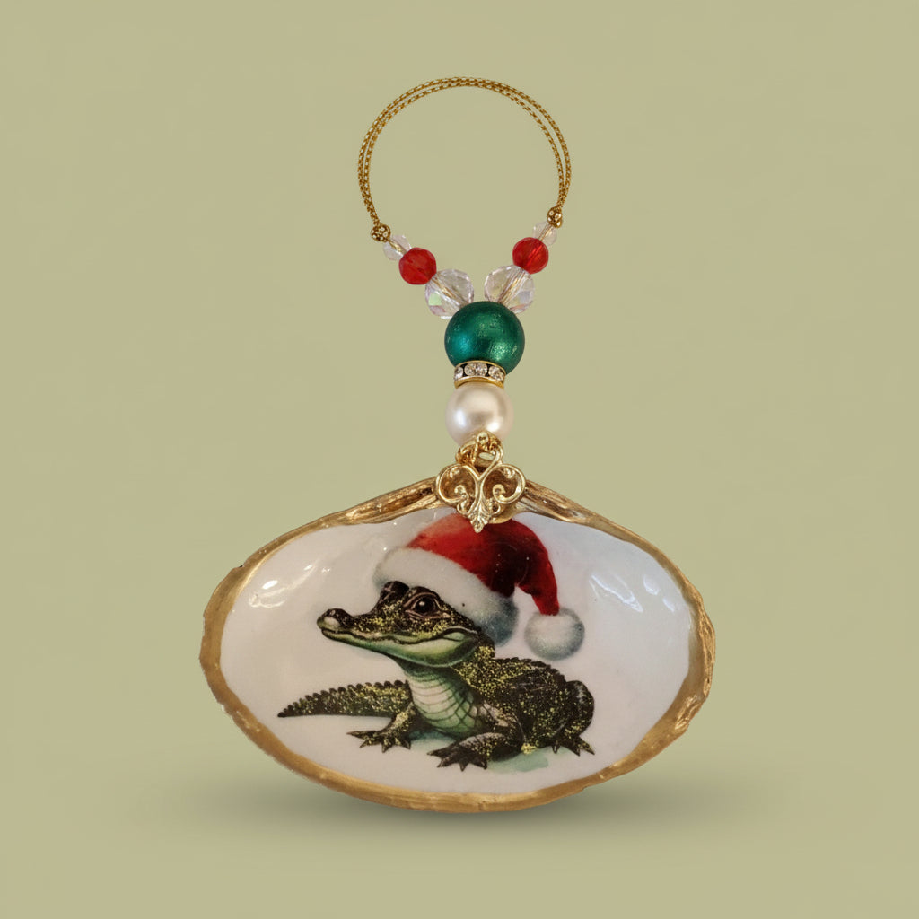 Decorative ornament with a Alligator wearing a Santa hat