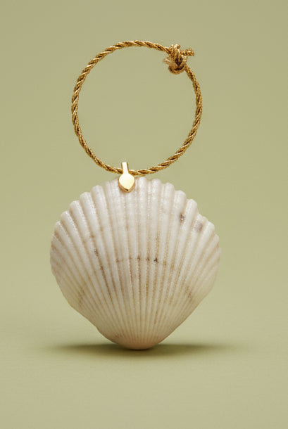 Shell ornament on a string