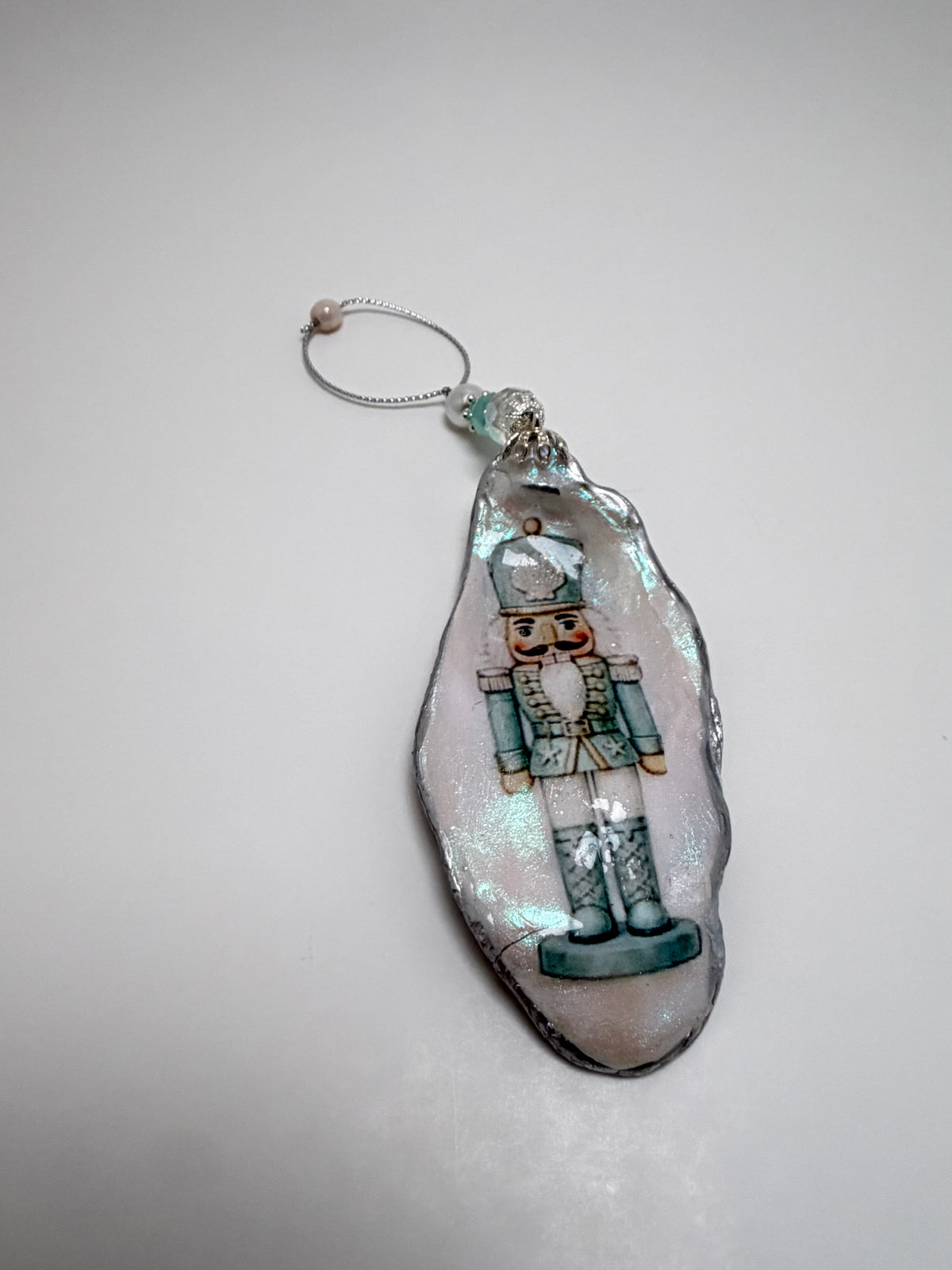 Coastal Nutcracker Oyster Shell Ornament