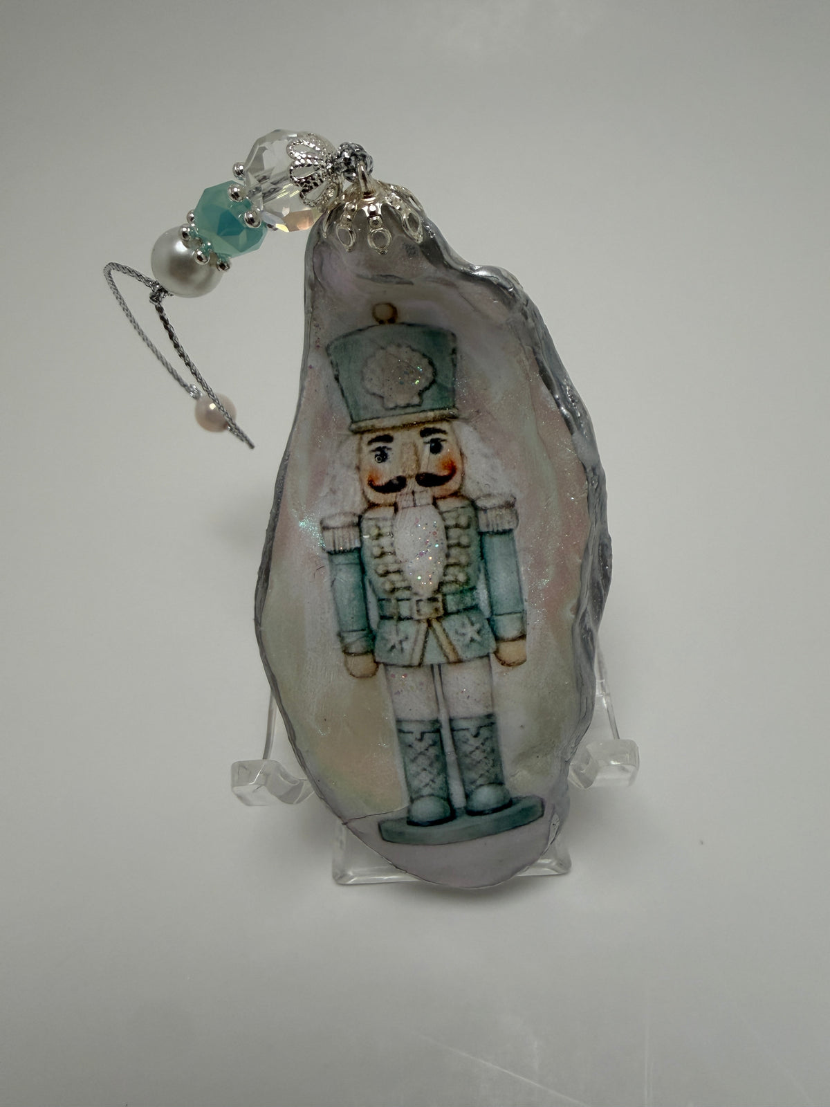 Coastal Nutcracker Oyster Shell Ornament