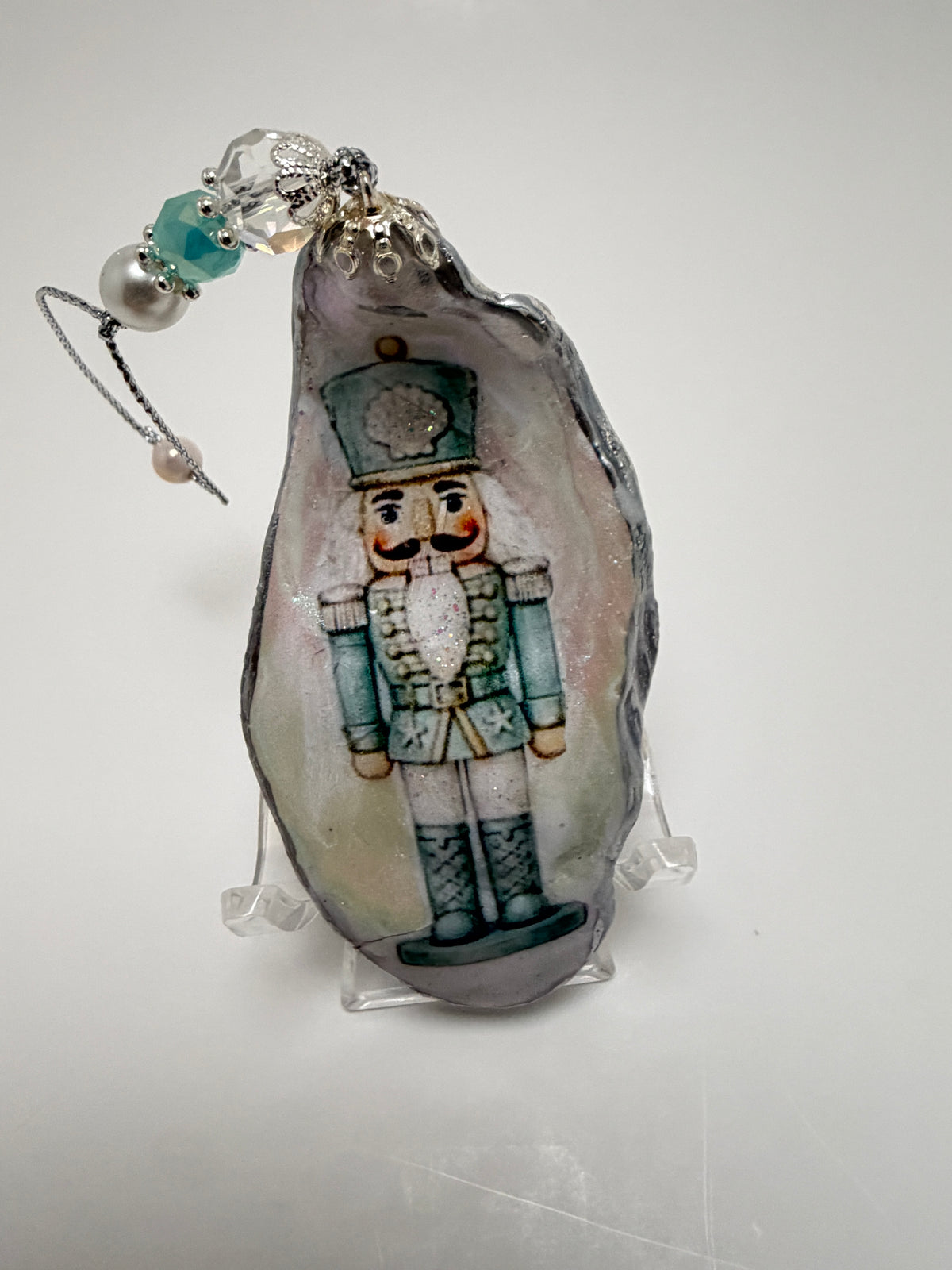 Coastal Nutcracker Oyster Shell Ornament