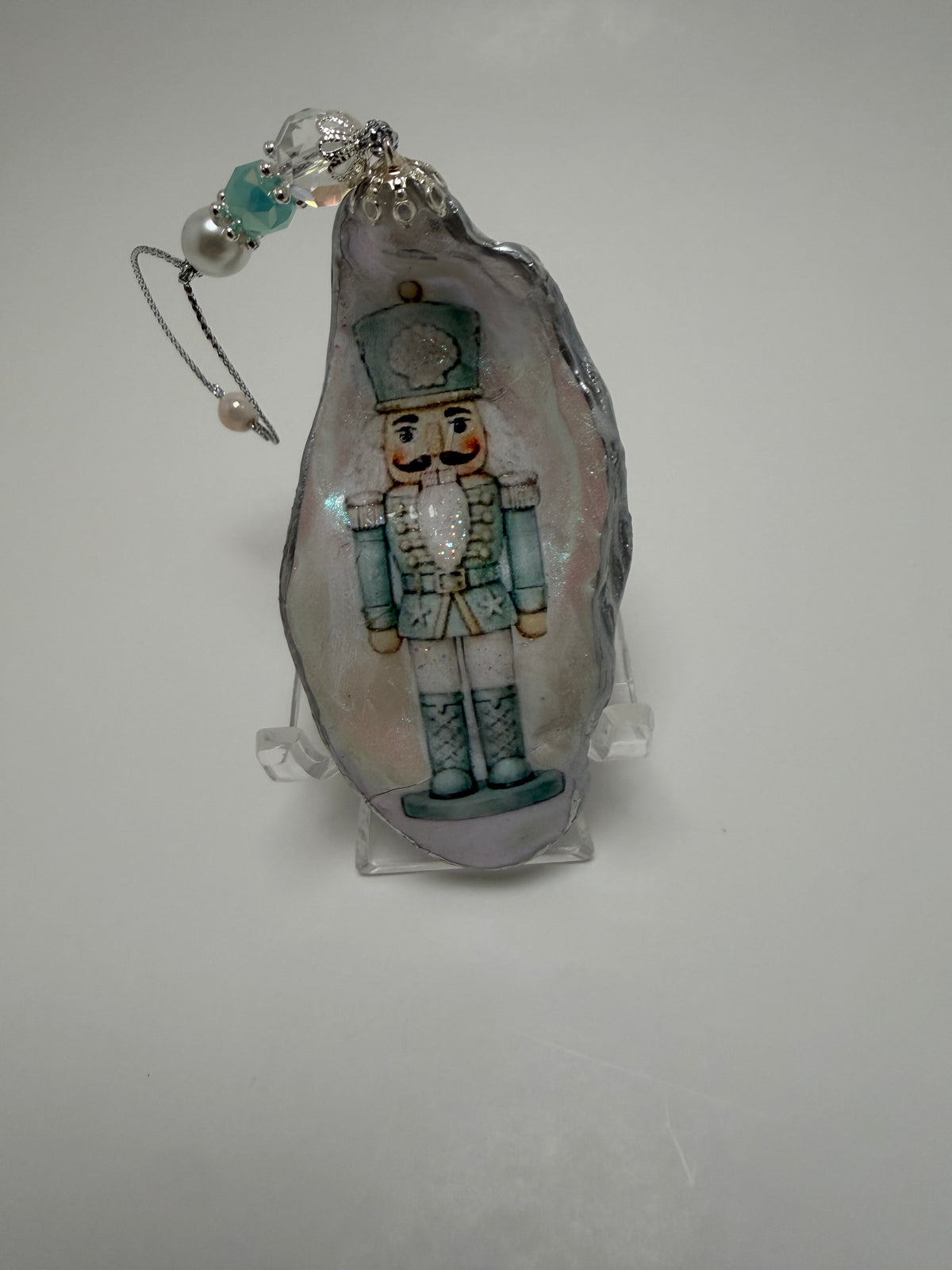 Coastal Nutcracker Oyster Shell Ornament